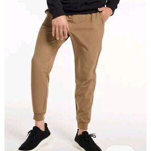 FLX Men's Dynamic Stretch Slim Joggers Sit at Waist Fitted Ankle Light Brown Pan